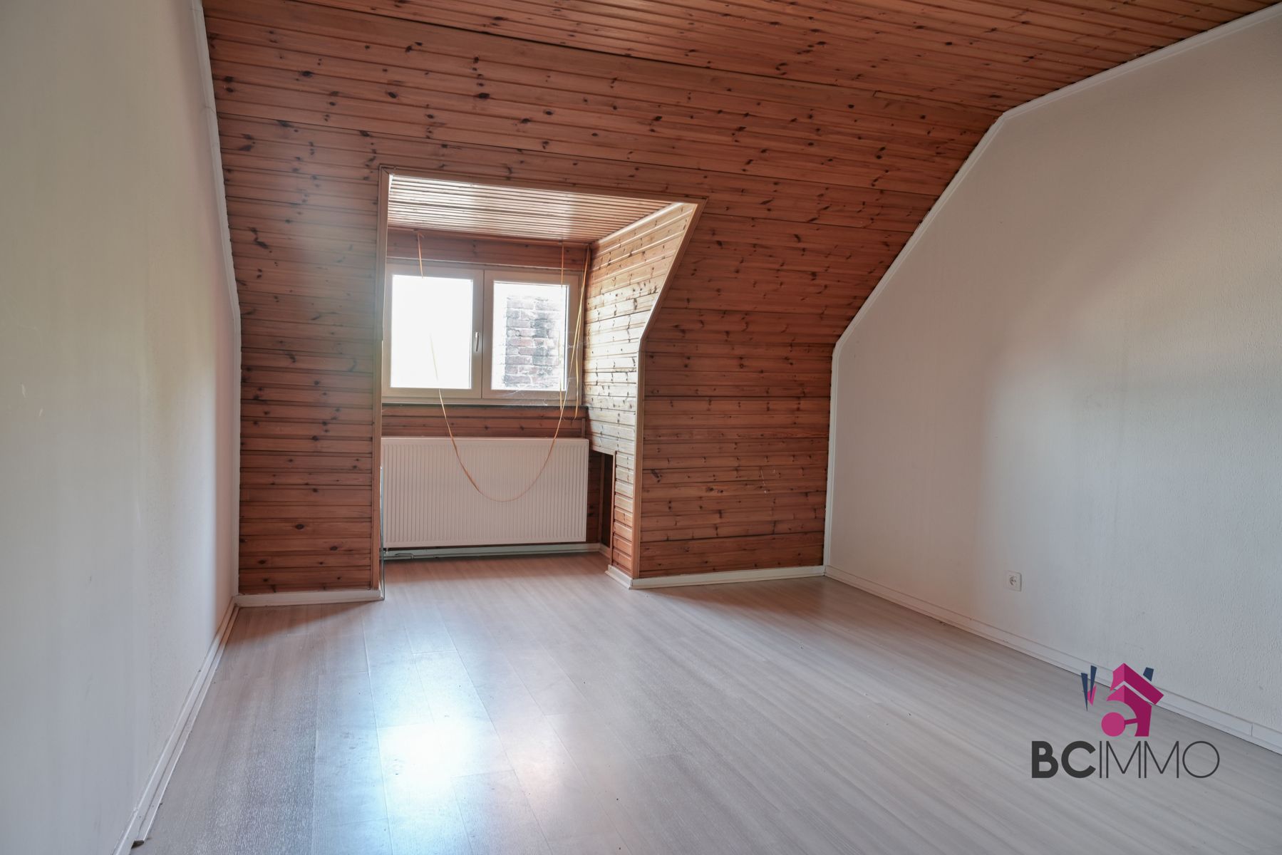 Handelswoonst met een triplex appartement te koop in Genk foto 12