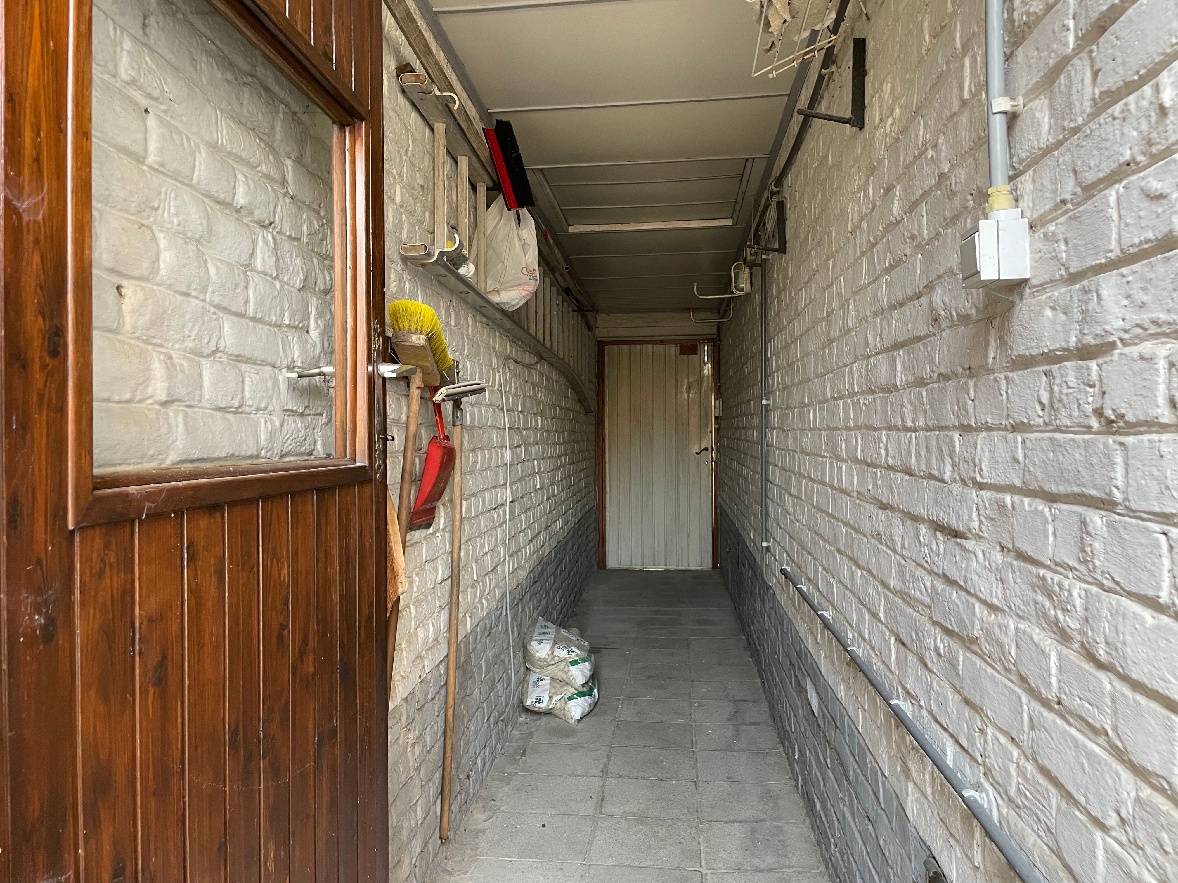Super gezellige stadswoning met super tuin foto 23
