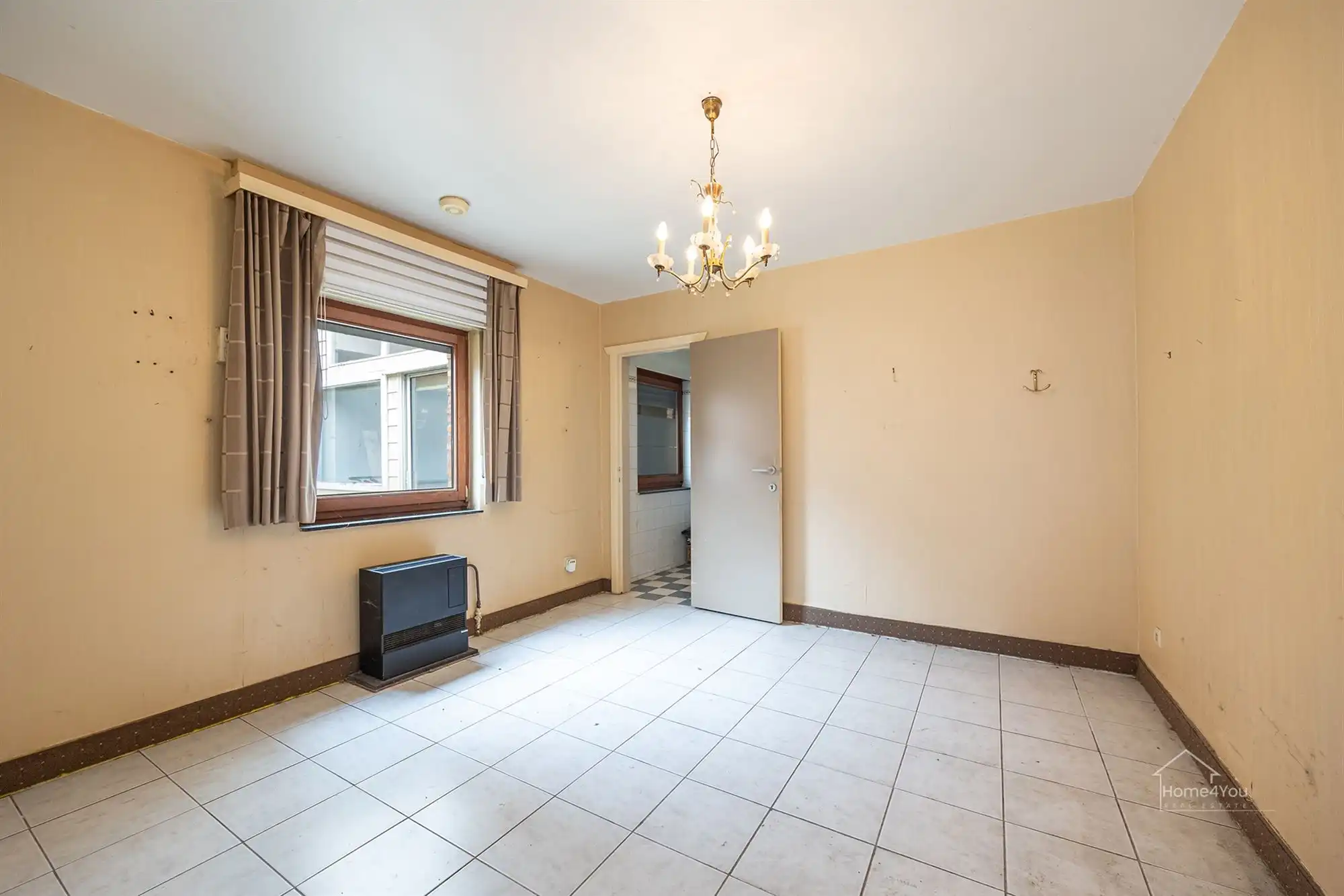 Te renoveren woning met groot potentieel en tuin te Bornem foto 9