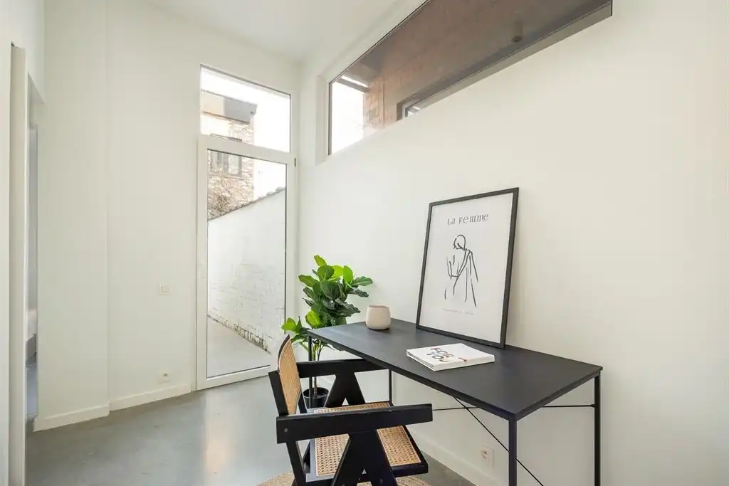 Gerenoveerd gelijkvloers appartement met stadstuin foto 7