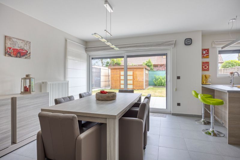 Instapklare halfopen woning met zuidgerichte tuin in Evergem! foto 4