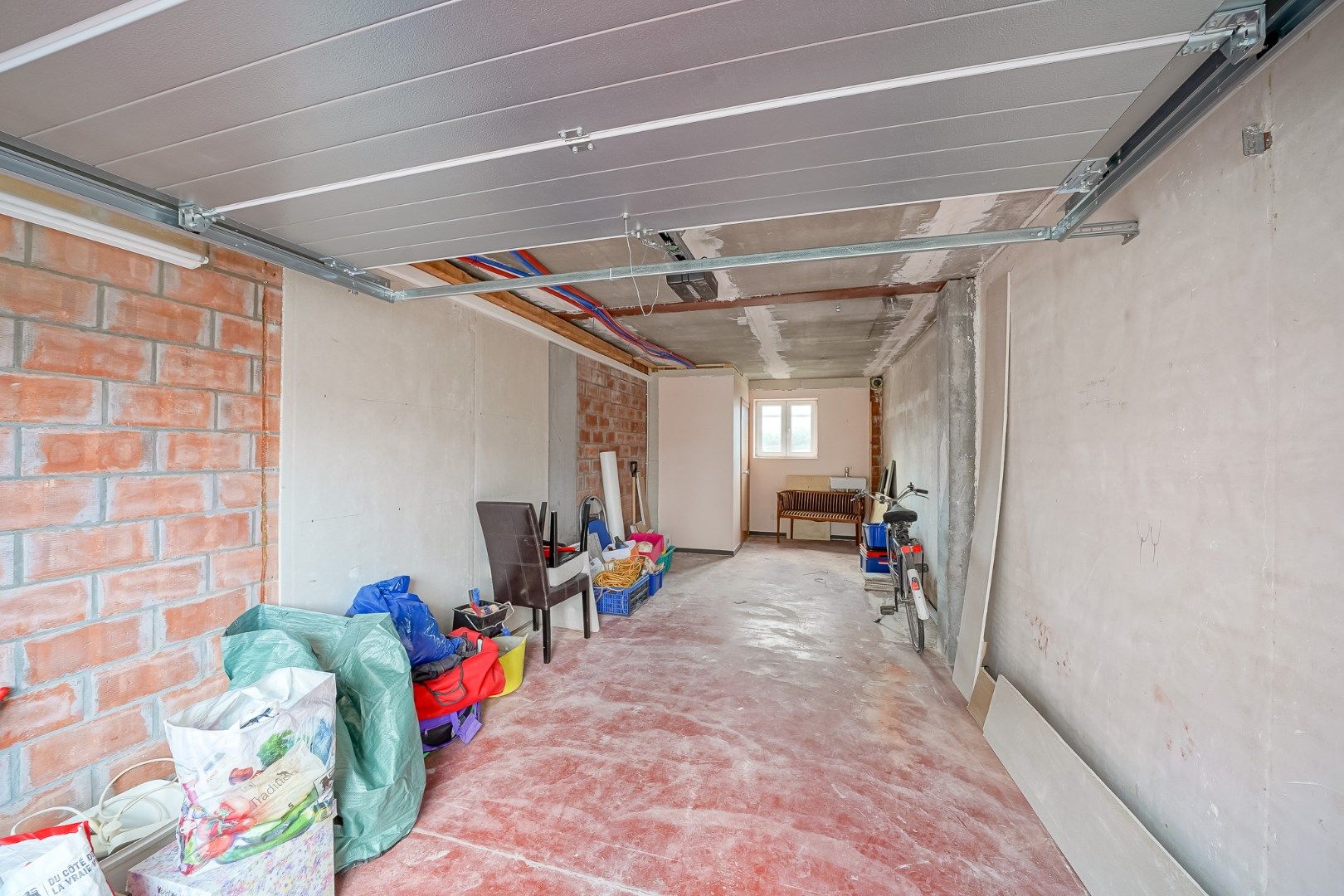 Ruim duplex appartement met 3 slaapkamers, garage en handelsruimte foto 18