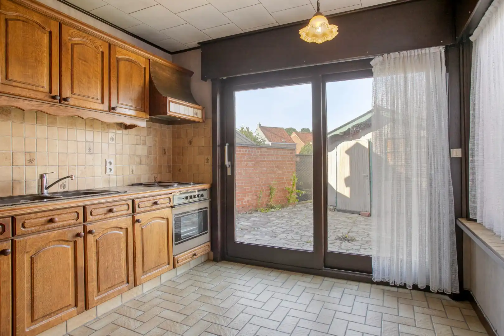 Gezellige rijwoning met 3 slaapkamers en garage! foto 5