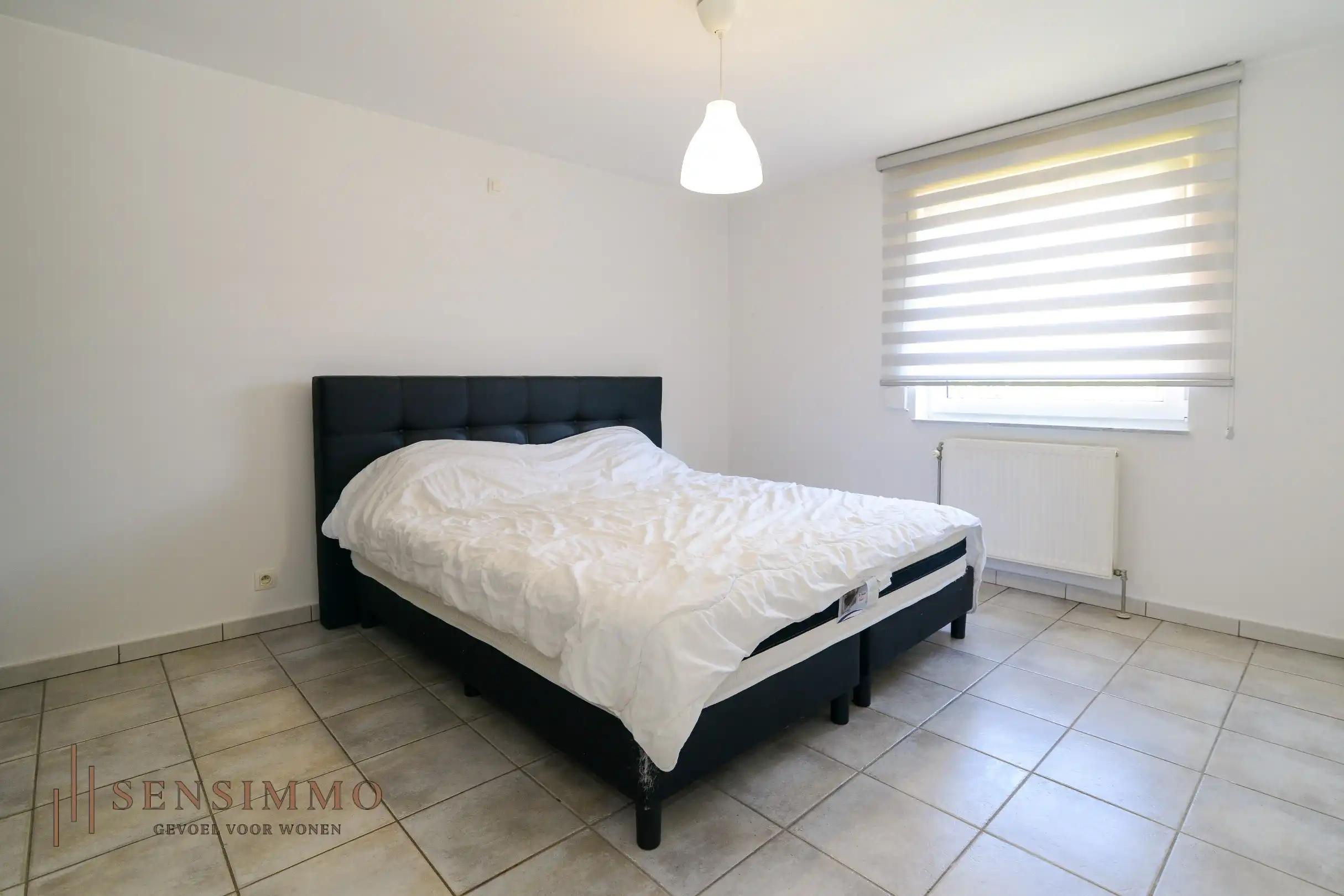 Instapklaar gelijkvloers appartement met 2 slpk foto 11