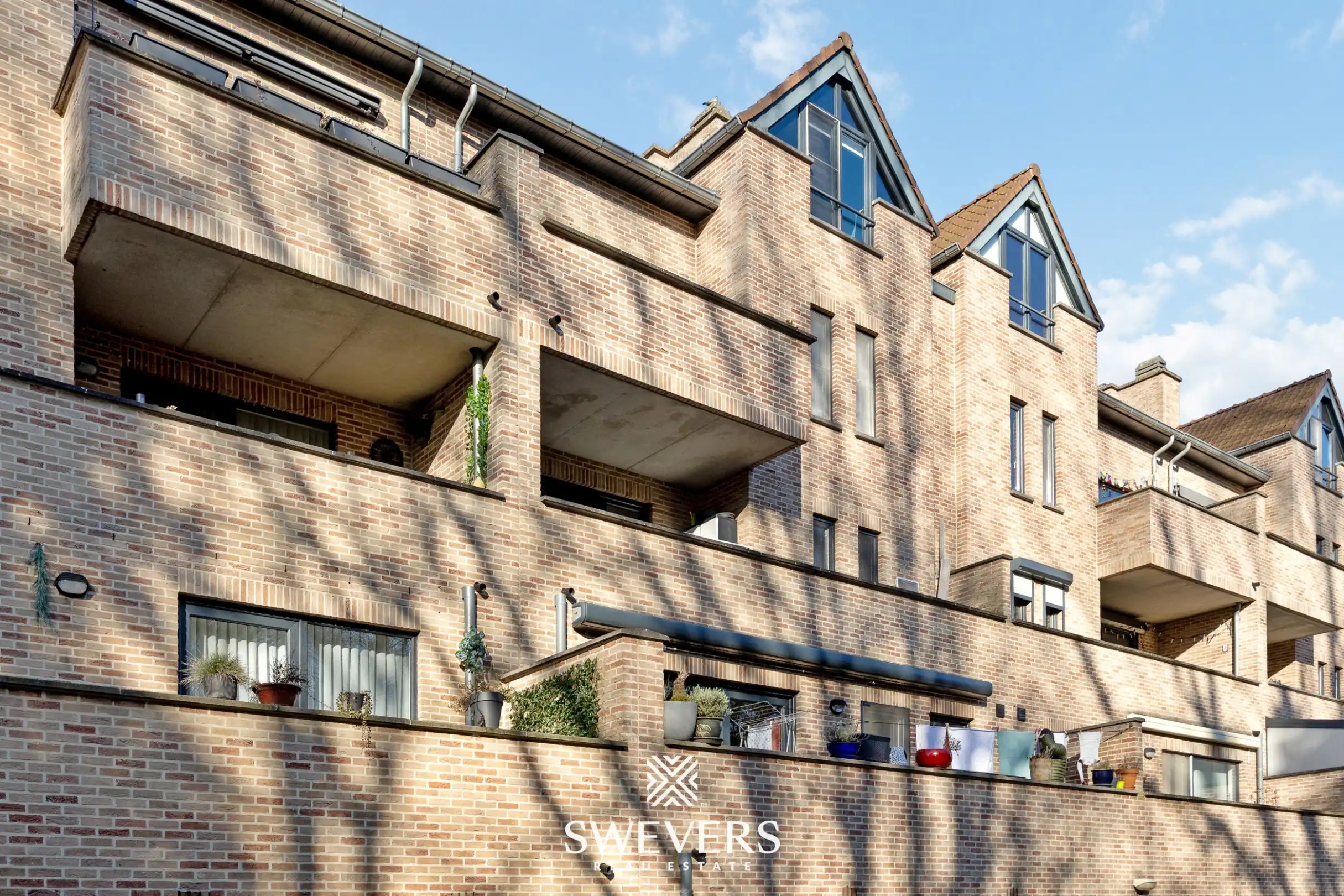 Instapklare duplex met zonnig terras en groen uitzicht in Genk foto 22