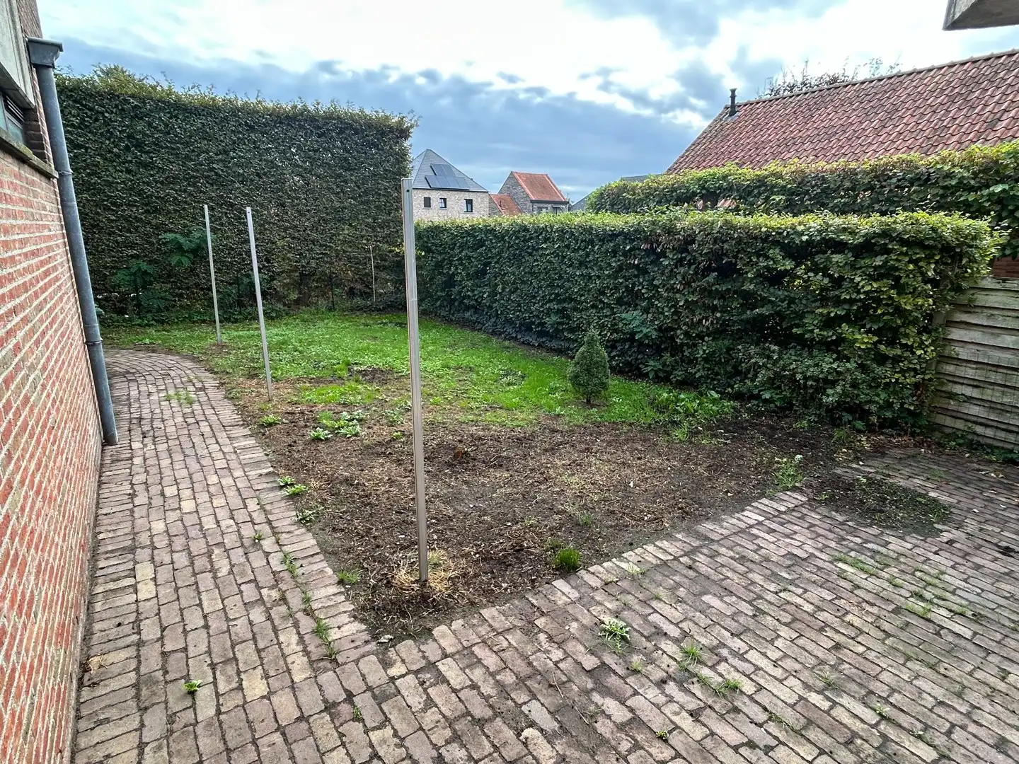 Appartement met 2 slpkmrs met terras en tuin in centrum Oevel te huur! foto 14