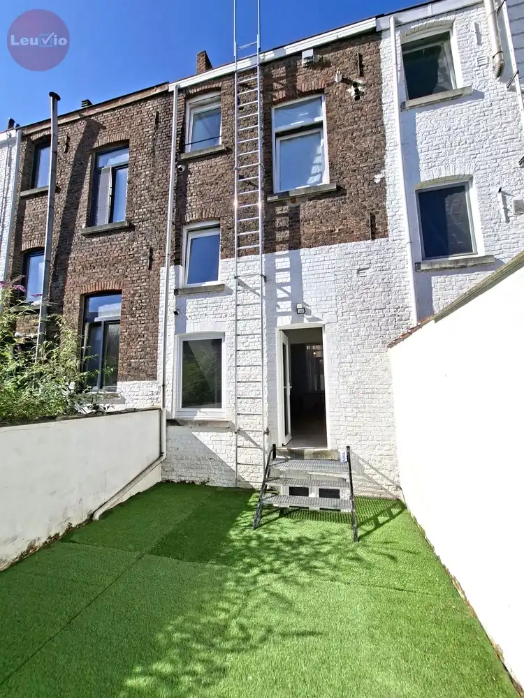 Instapklaar 1-slaapkamerappartement met tuin in het stadscentrum foto 17