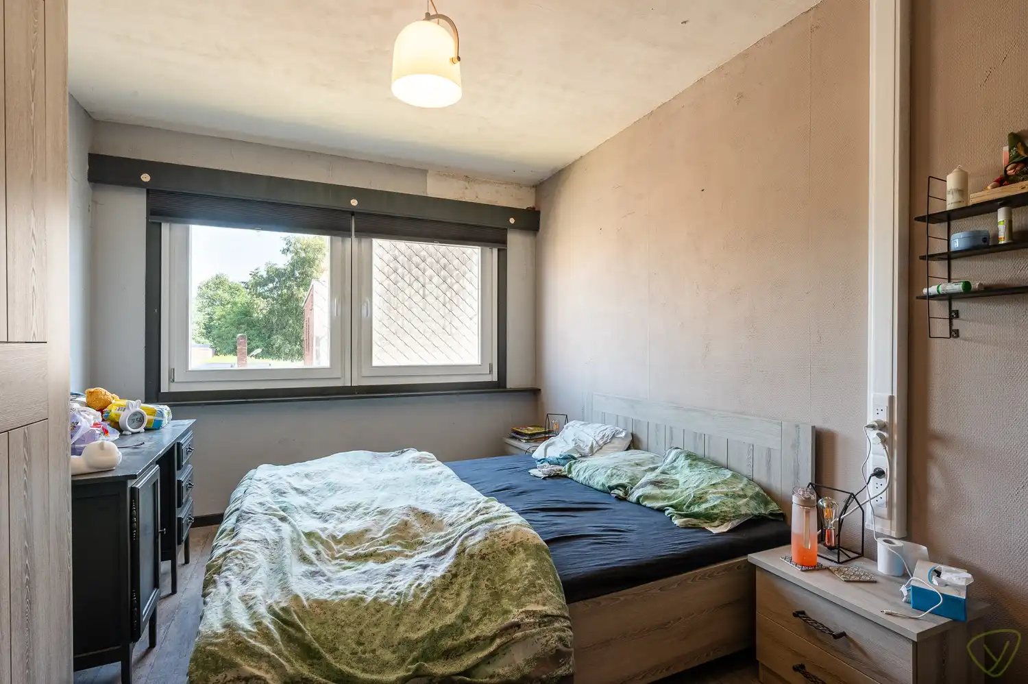 Te renoveren gezinswoning met grote tuin in het centrum van Bassevelde foto 9