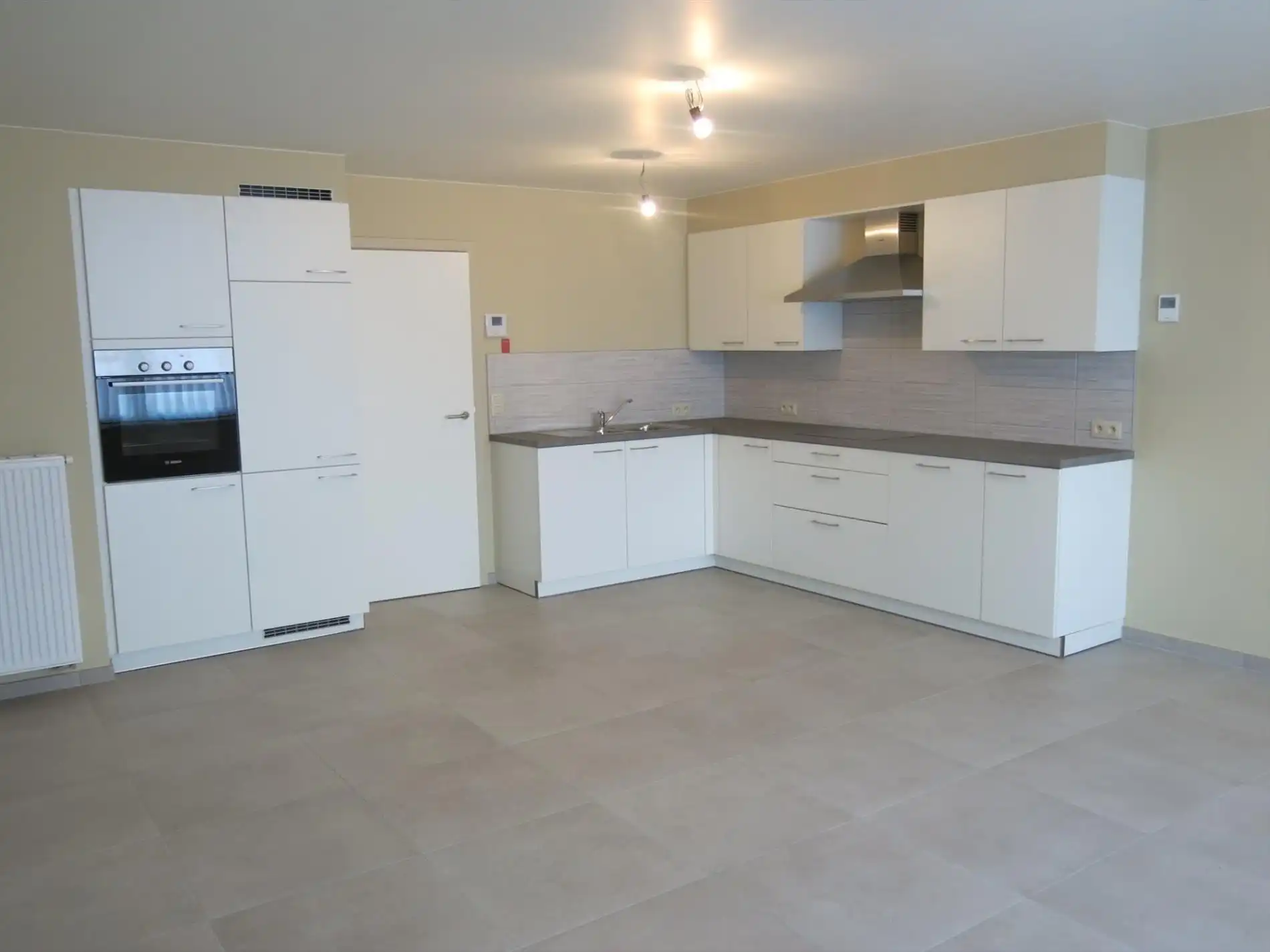 Nieuwbouwappartement met 2 slaapkamers op de Markt in Houthulst foto 2