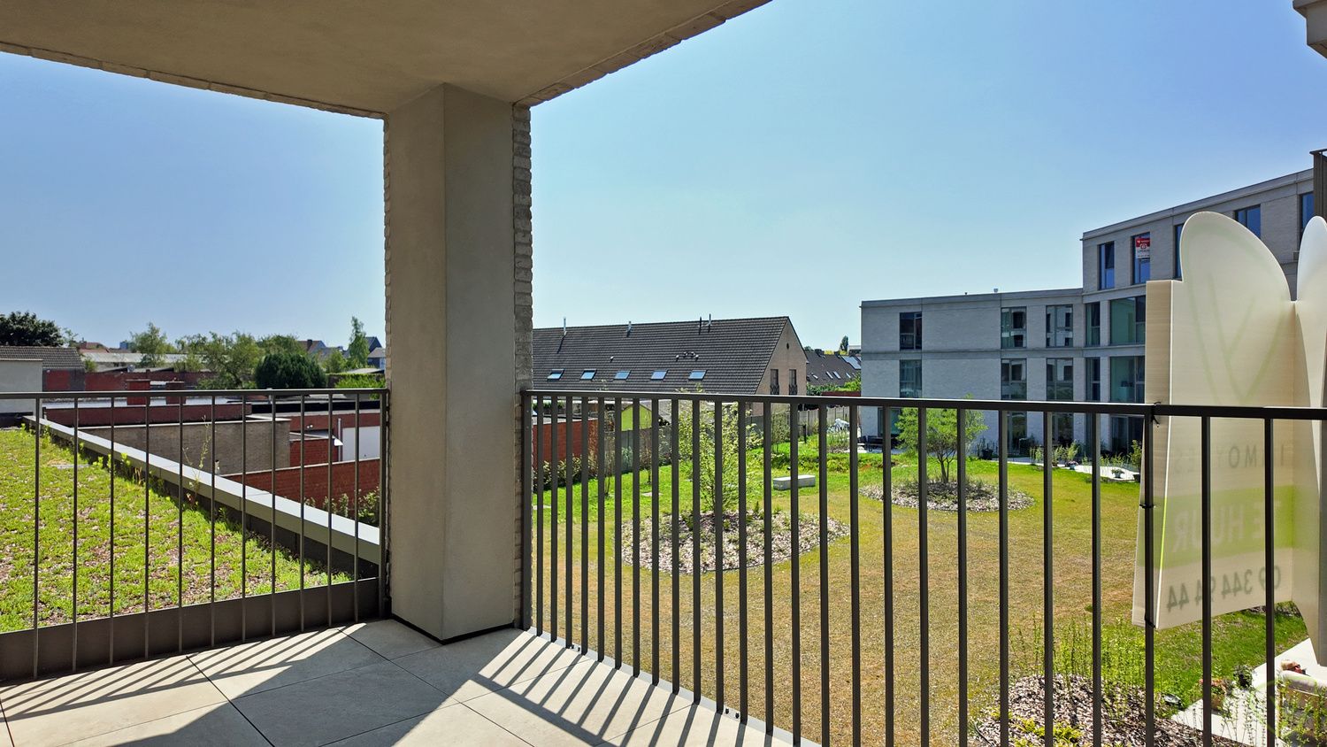 Nieuwbouwappartement met terras en parkeerplaats in het Molenpark te Eeklo! foto 11