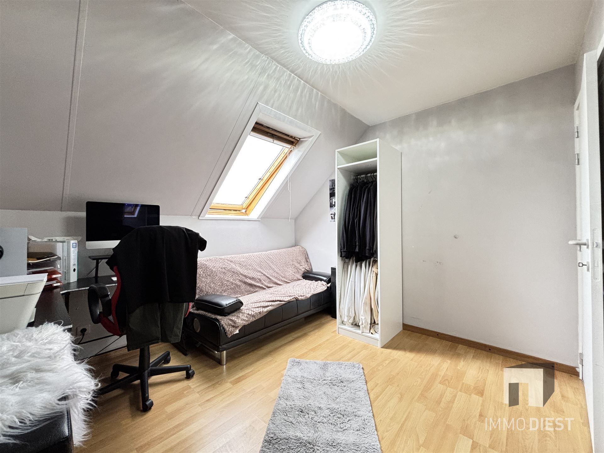 Duplex appartement op de tweede verdieping in het centrum van Tessenderlo foto 8