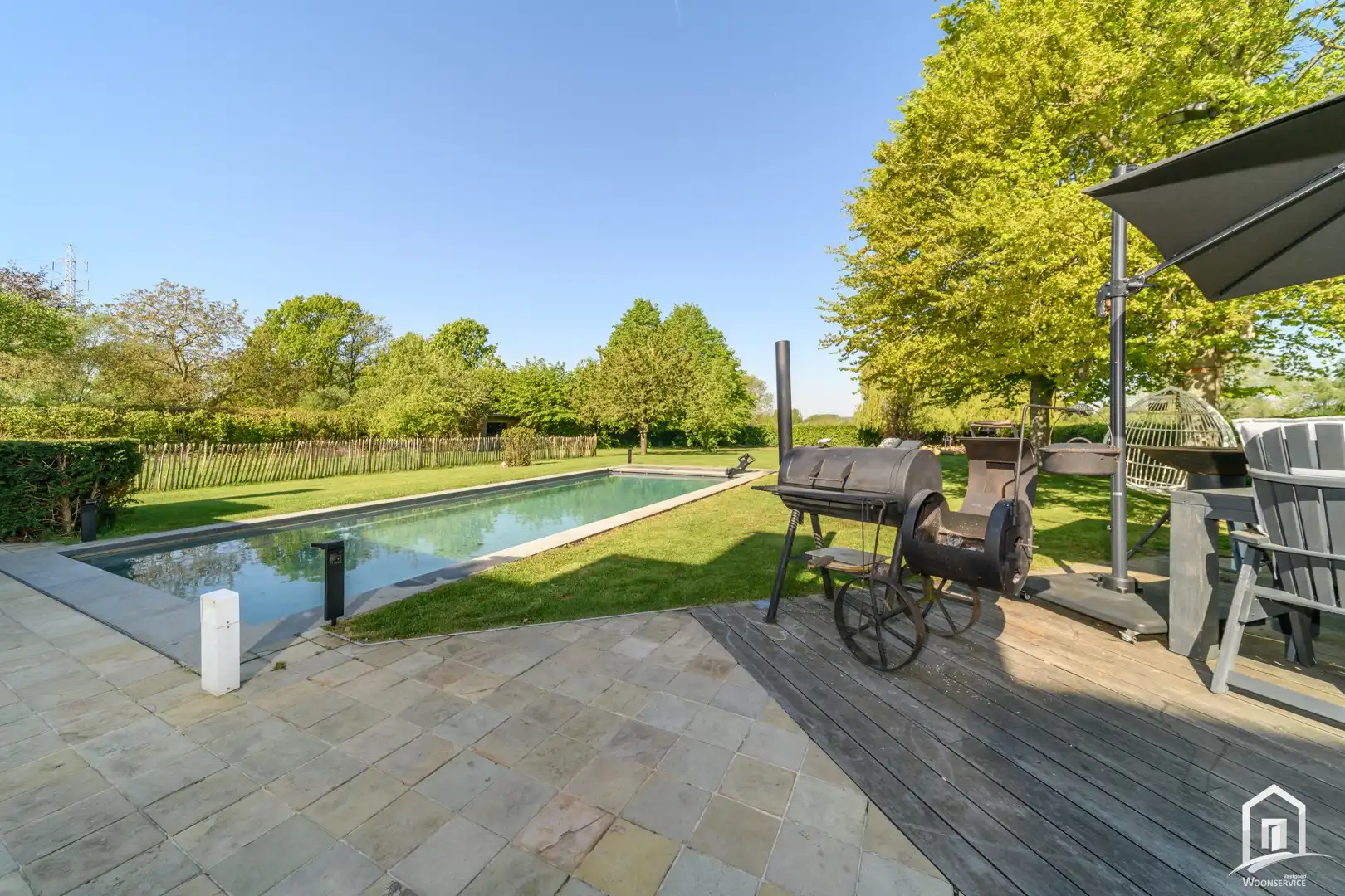 Instapklare villa met 3 SLK's, garage en riante tuin met zwembad foto 23
