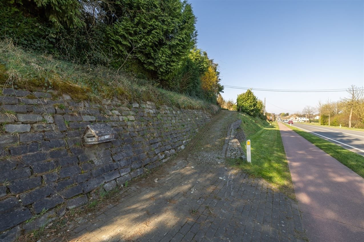 Uniek perceel, groot tuindeel zuidwest, klein weiland op top heuvel foto 2