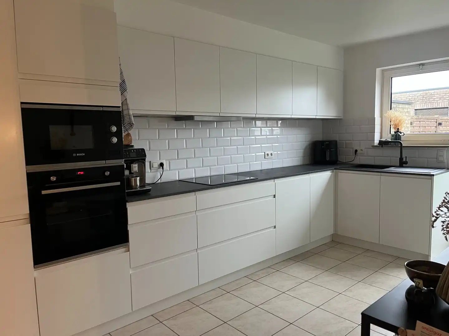 Gezellig halfopen woning met tuin en terras. foto 4