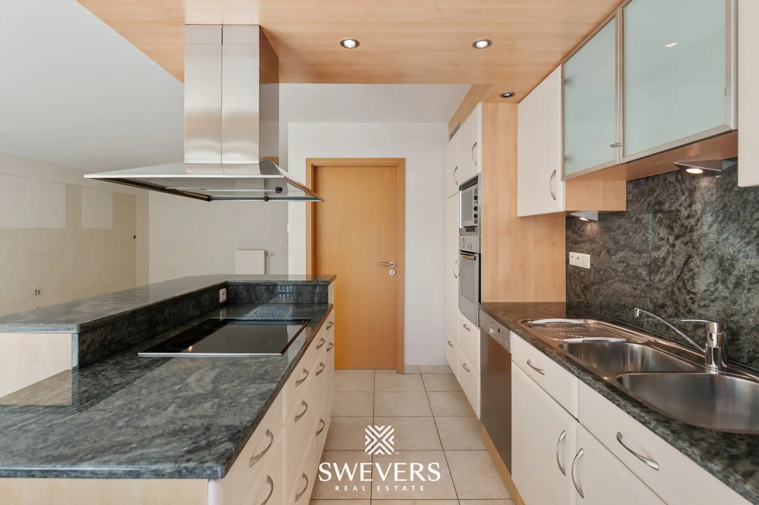 Gelijkvloers appartement met twee slaapkamers, ruime veranda en terras te Bree foto 10