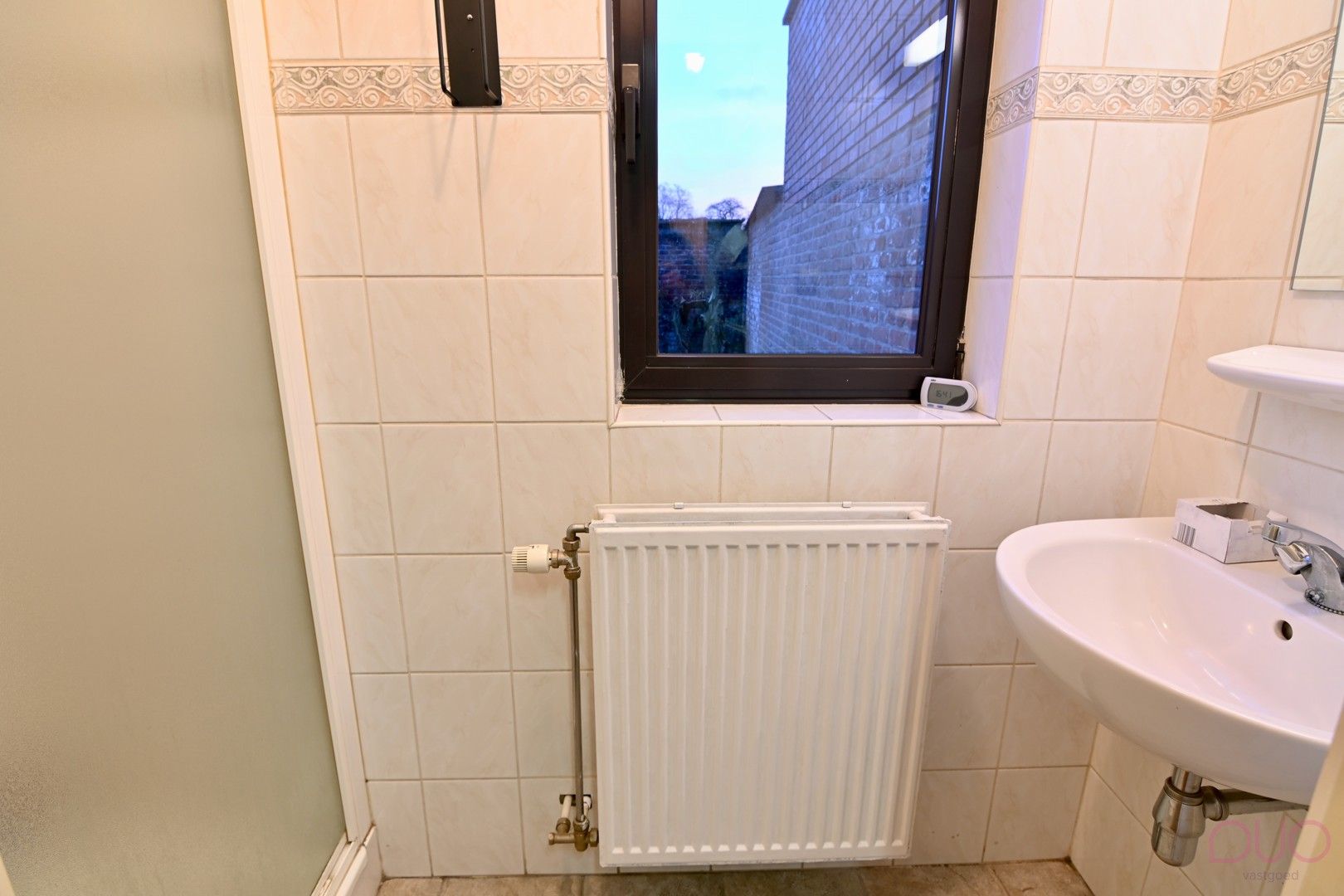 Instapklare woning in hartje Sint-Truiden met gezellige stadstuin en garage foto 20