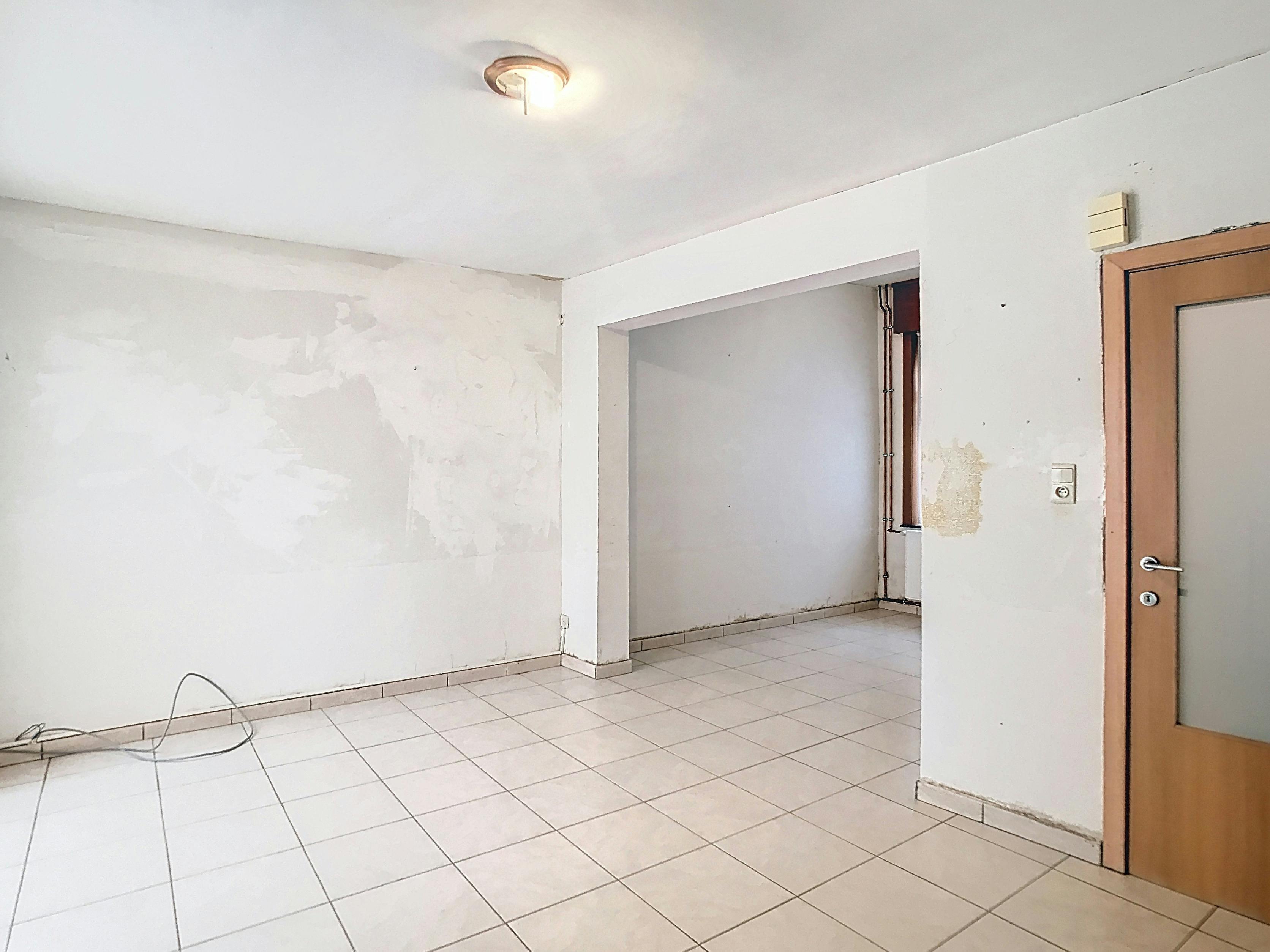 Huis te koop in Ieper centrum met 3 slaapkamers en stadstuin foto 4