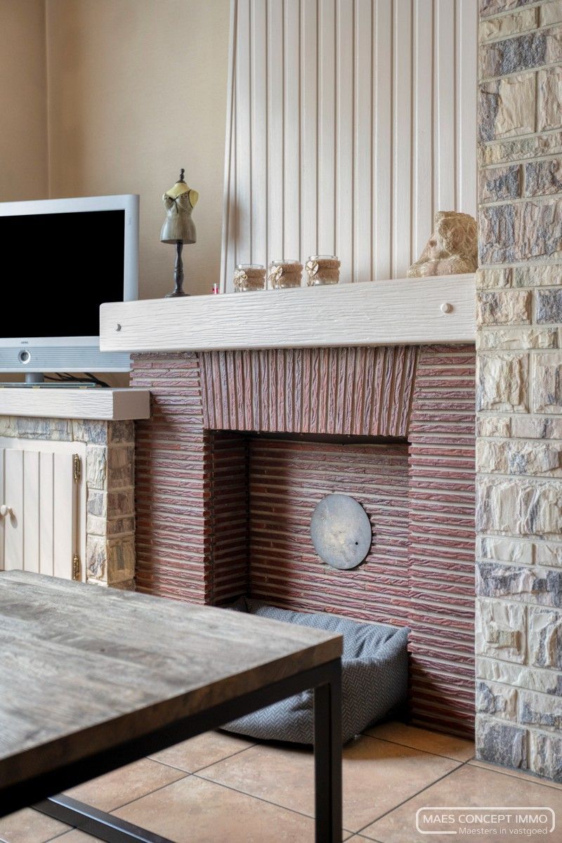 Gezellige halfopen woning met ruime groene tuin foto 3