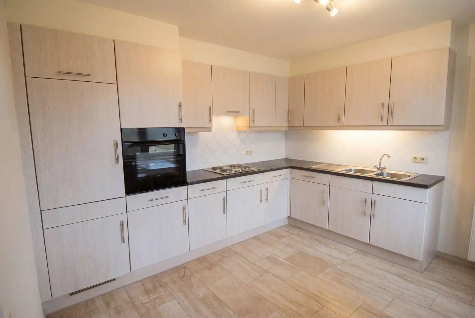 Ruim appartement met 2 slaapkamers, 2 terrasjes en ondergrondse autostaanplaats foto 3