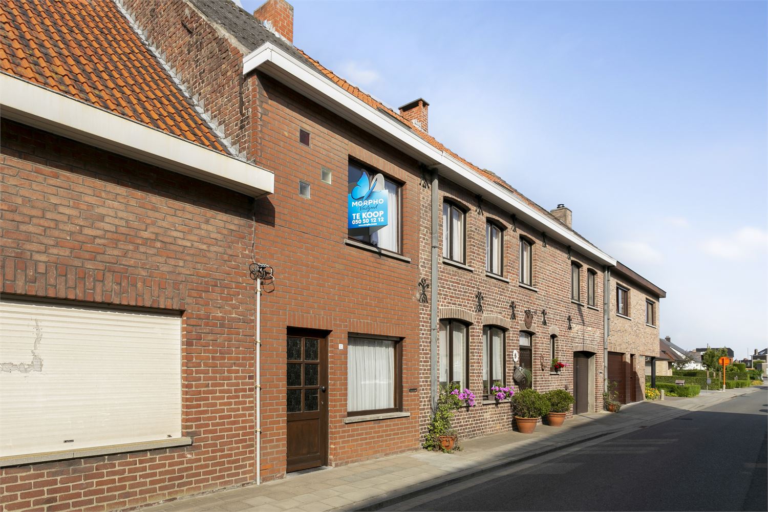 Knusse rijwoning met 2 slpks, tuin en toekomstig HOB-potentieel in rustige ligging foto 4