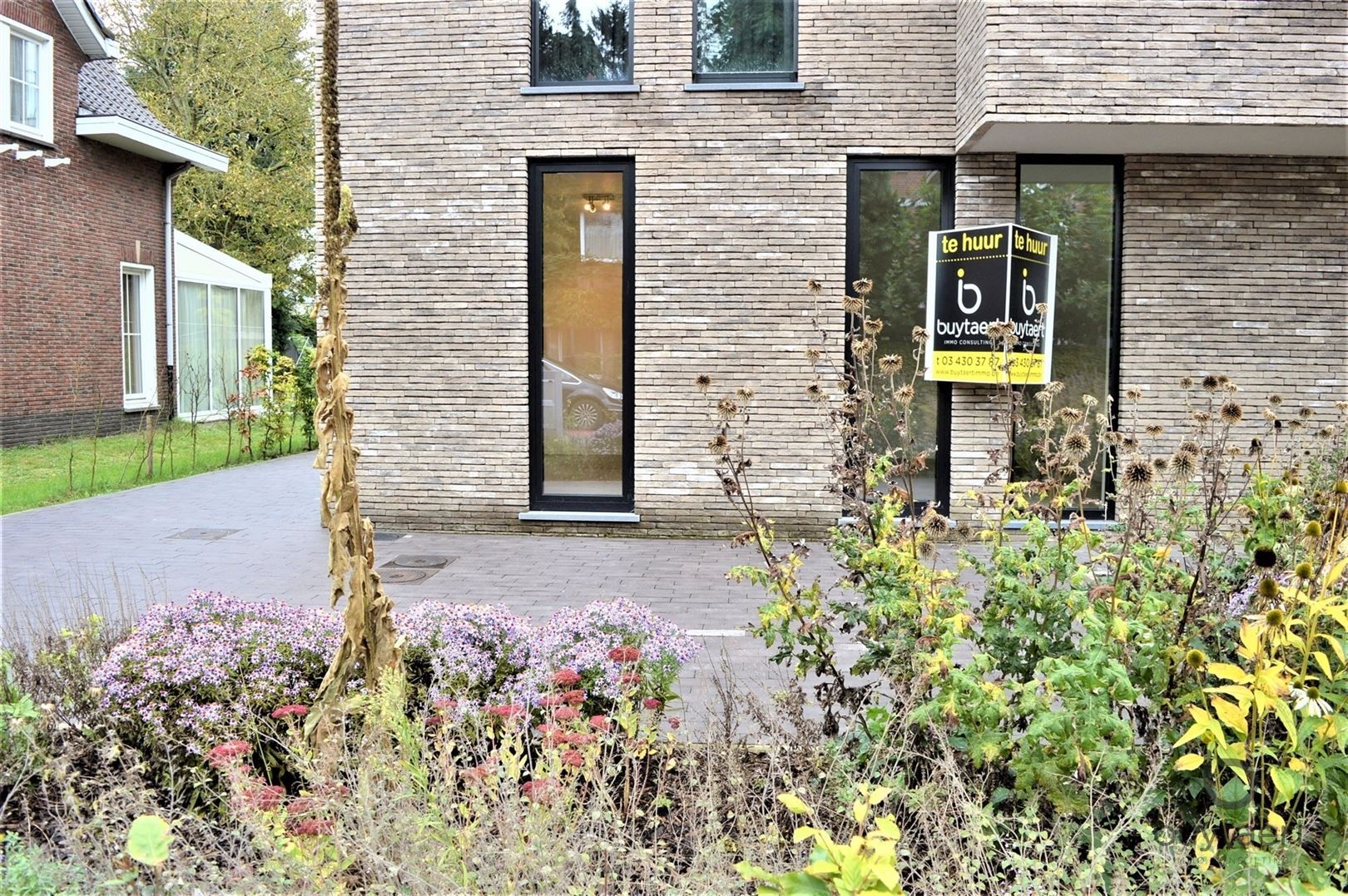 Gelijkvloers appartement met twee slpks en tuin! foto 14