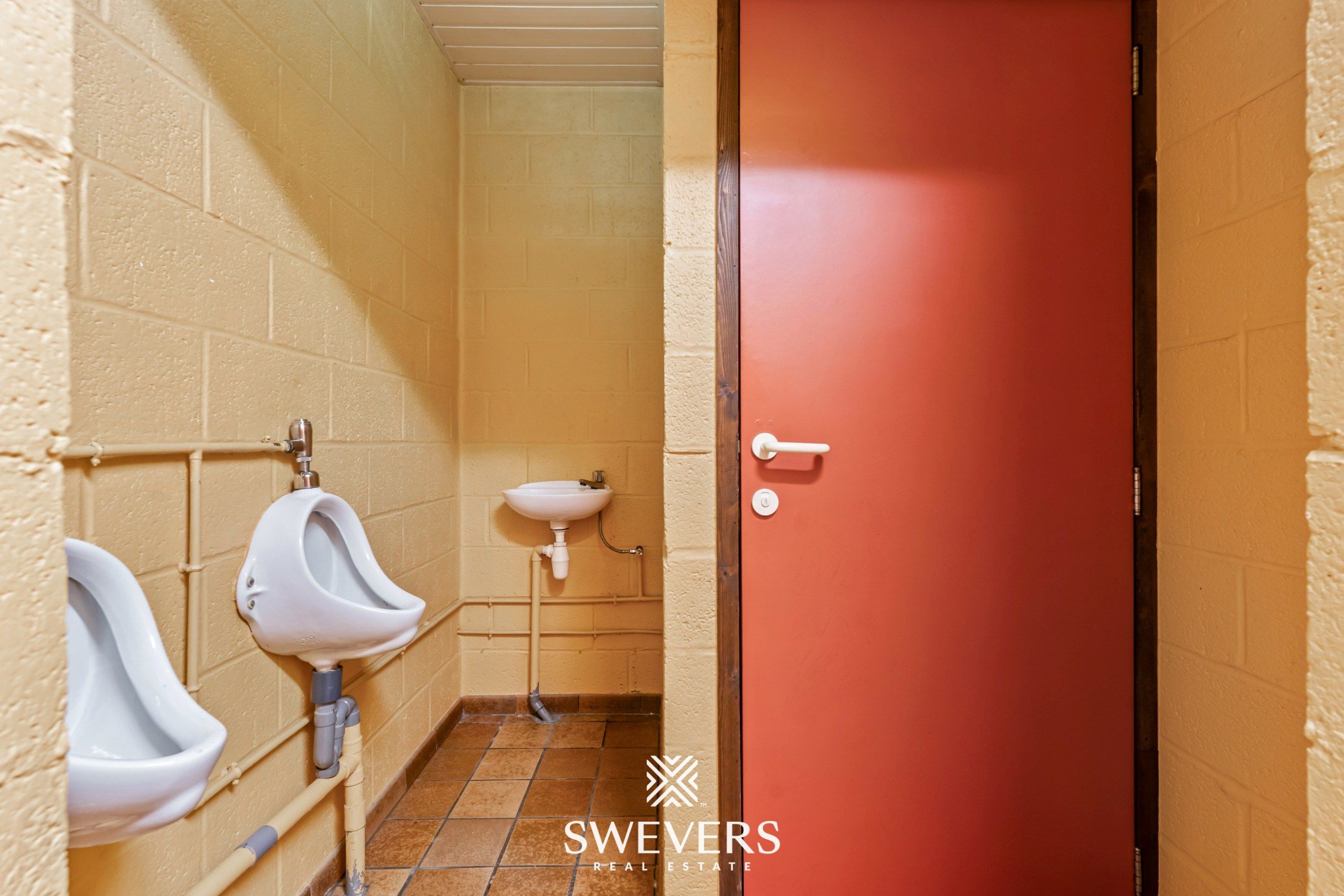 Instapklaar handelspand met woonst en tuin in Herk-de-Stad foto 9