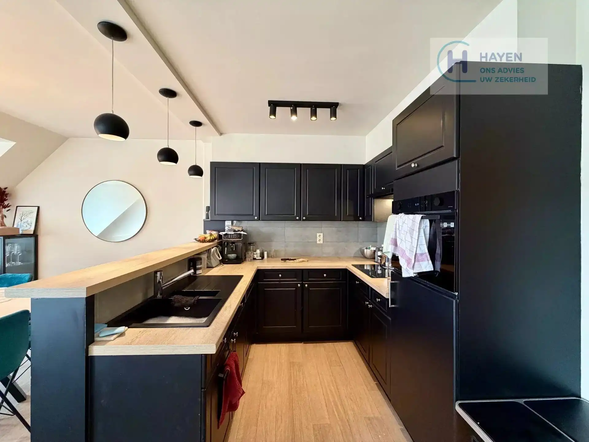 Instapklaar appartement met 2 slaapkamers en bovengrondse garage in hartje Kermt foto 4
