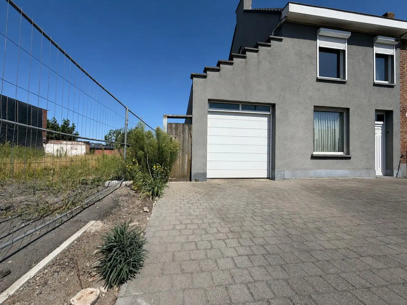 Instapklare woning met 3 slpks. + garage én zonnige tuin foto 11