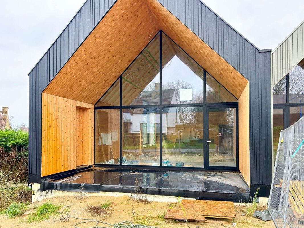 Unieke architecturale woning te koop in Sint-Idesbald foto {{pictureIndex}}