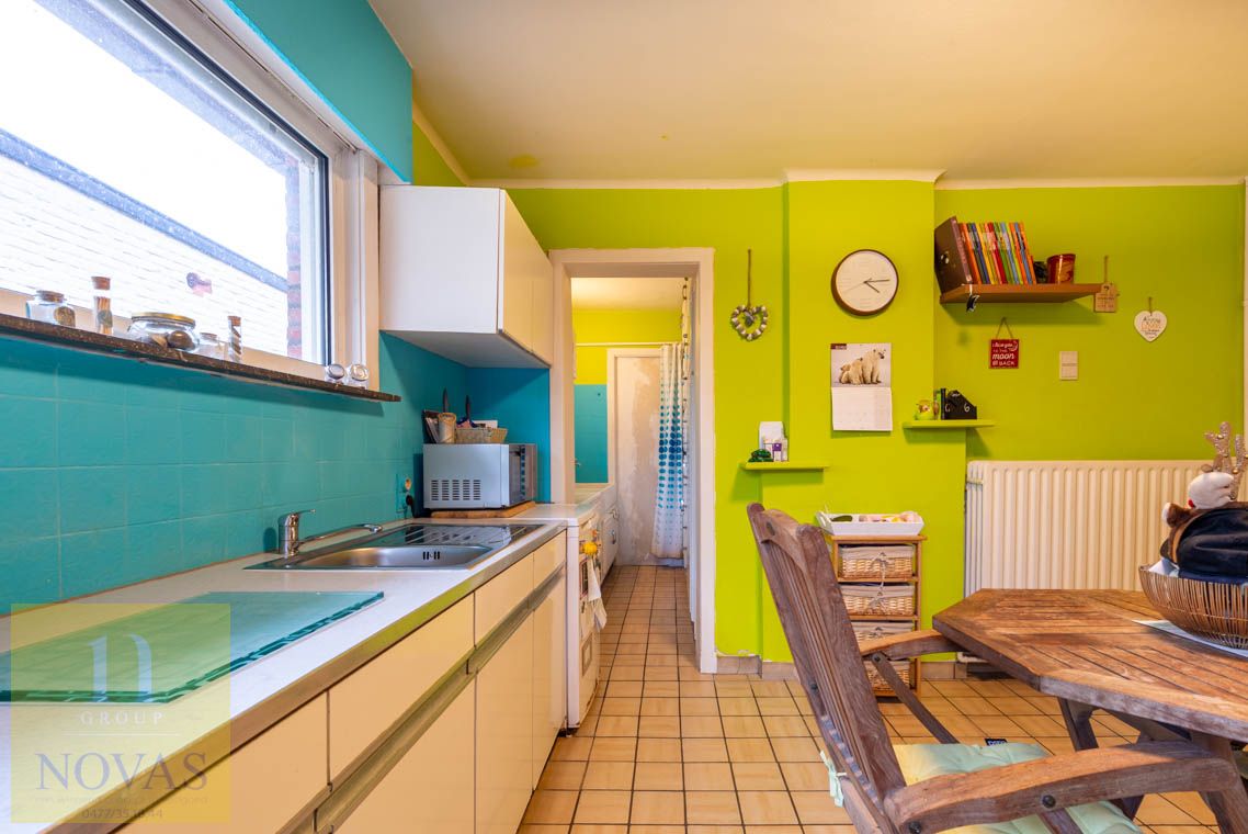 Gezellige woning met 3 slaapkamers, fijne woonkamer en diepe tuin foto 9