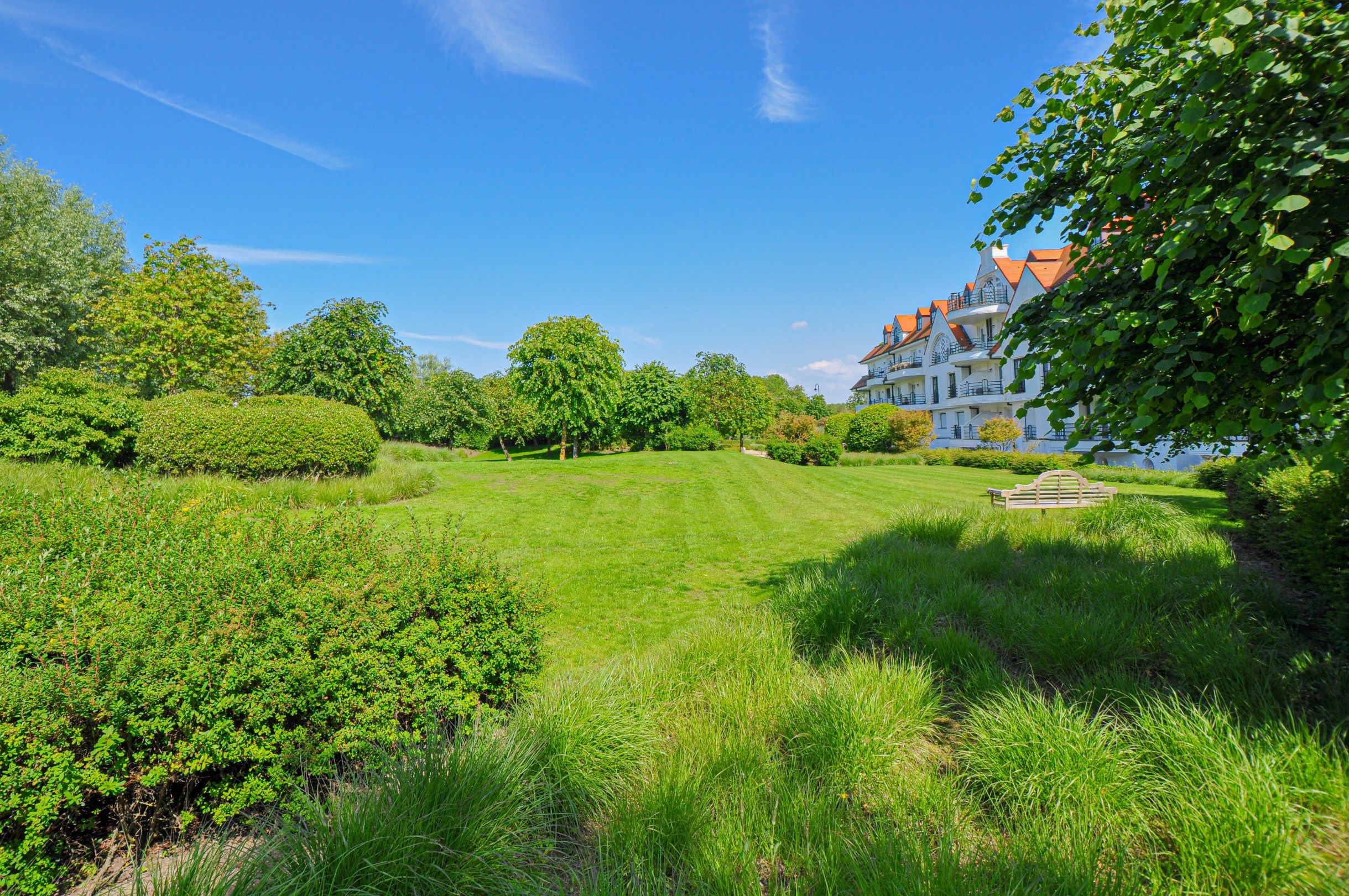 Subliem hoekappartement met ruime terrassen gelegen in het prestigieuze domein Tennis Garden. foto 33