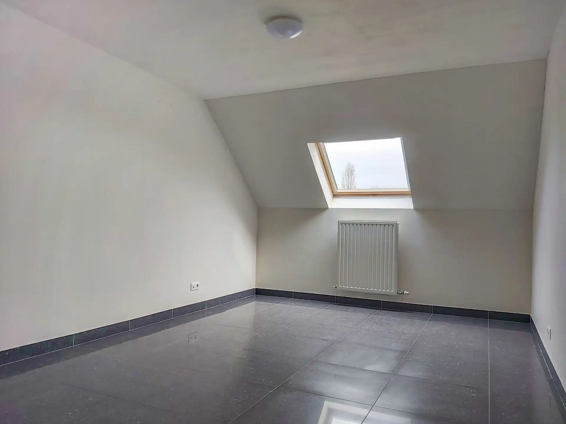 Ruime triplex met studio te koop in Opgrimbie! foto 12