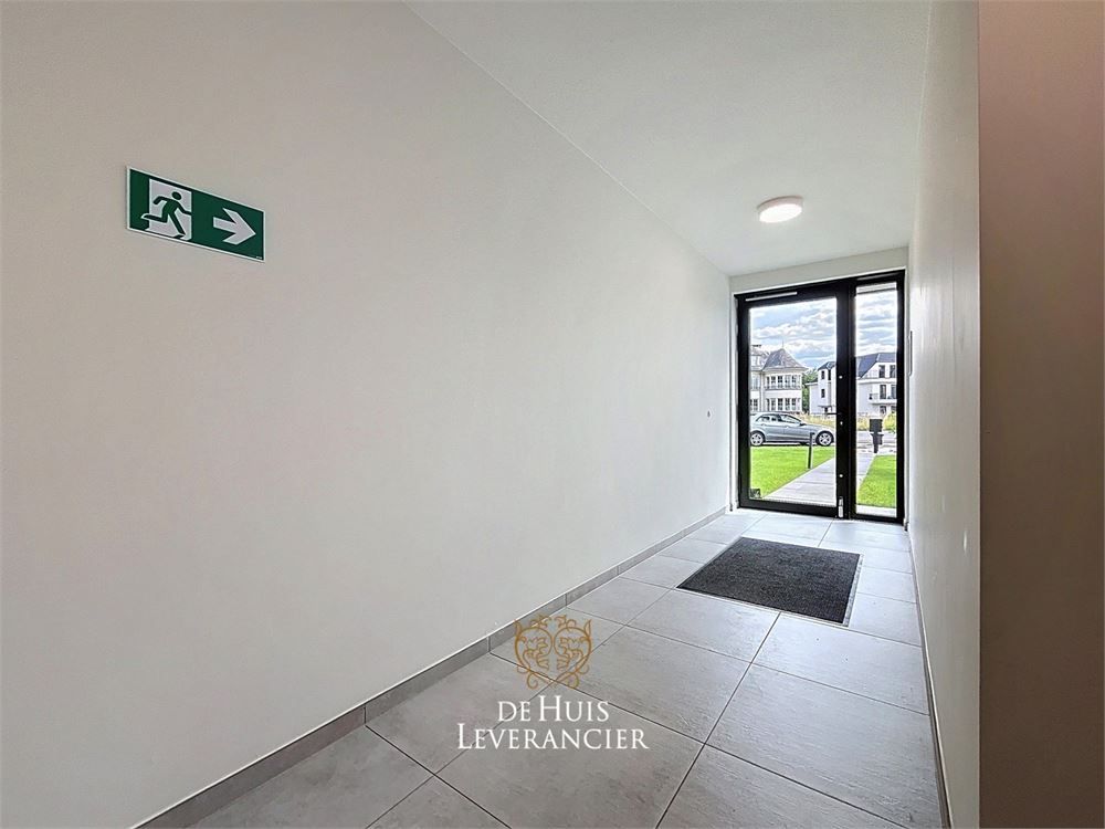 Discrete luxe & tijdloze elegantie : subliem nieuwbouwappartement met terras en gemeenschappelijk tuin te koop in Boechout foto 31