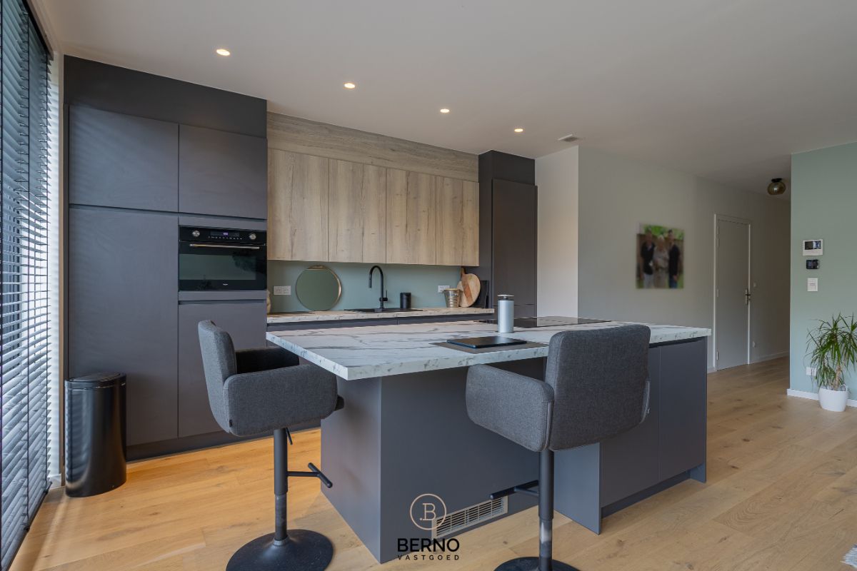 Recent gelijkvloers appartement met zonnig terras en tuintje in Opstal foto 5