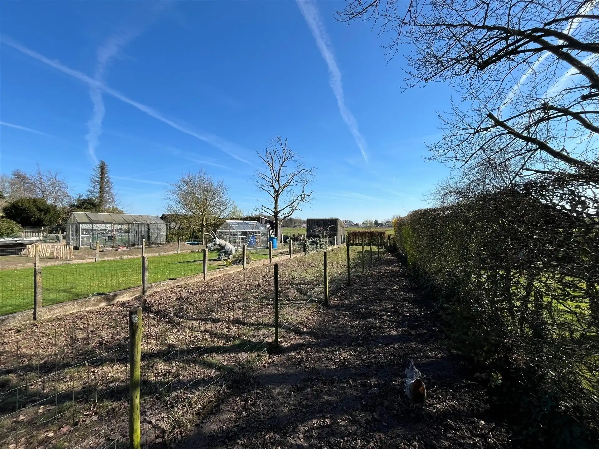 Gezinswoning met garage op perceel van 900m² met weids uitzicht! foto 16