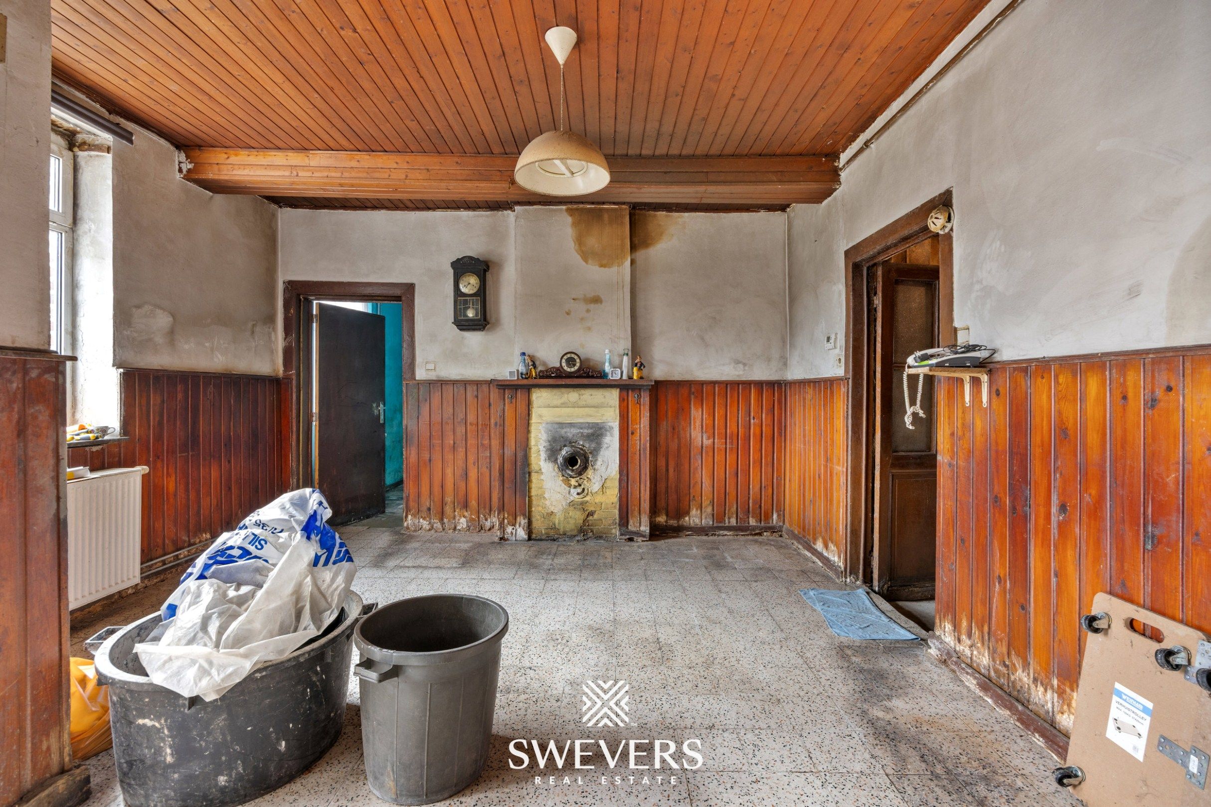 Te renoveren open bebouwing met groot perceel in rustige straat in Bilzen foto 2