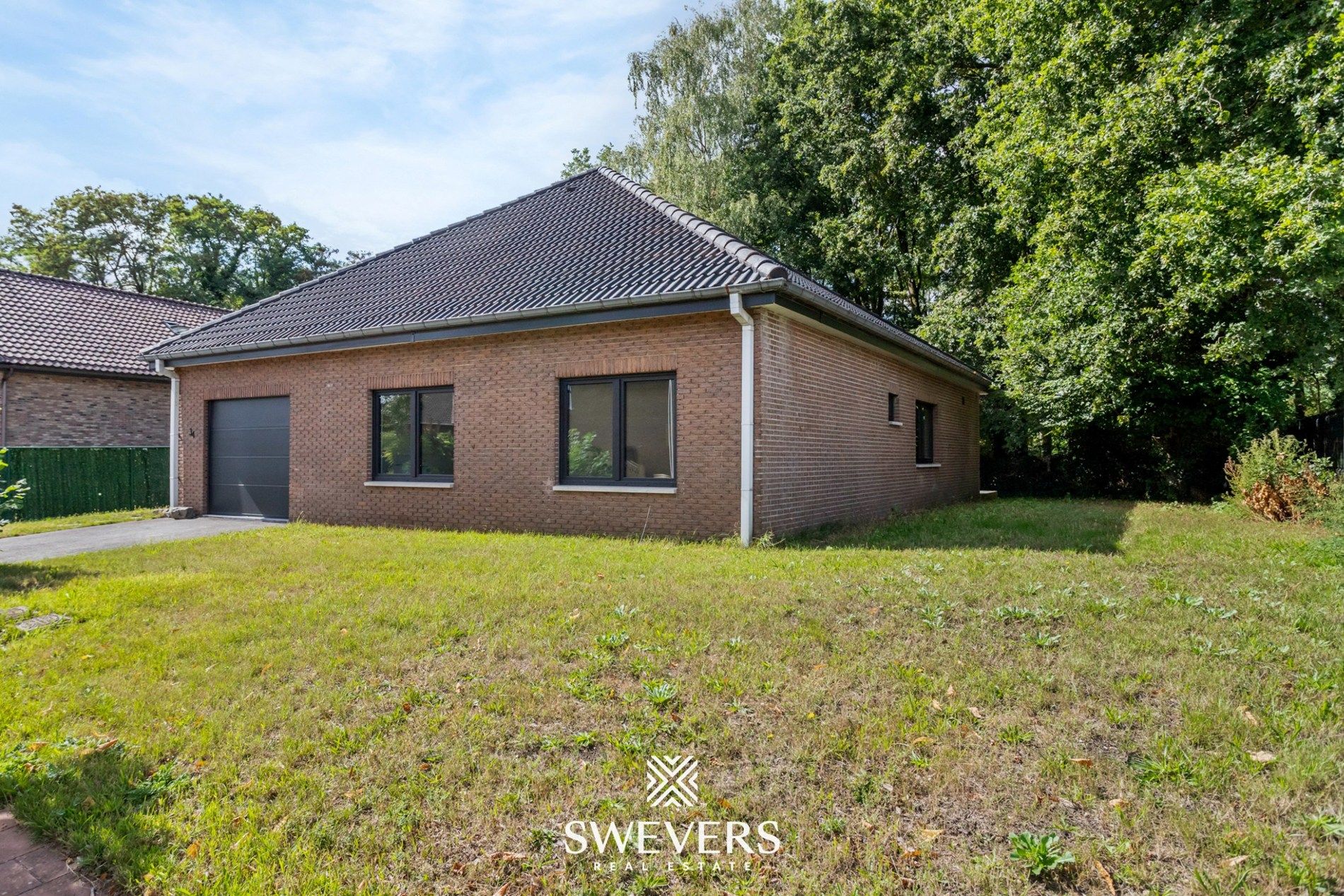 Volledig gerenoveerde gezinswoning met garage en tuin te Genk foto 31