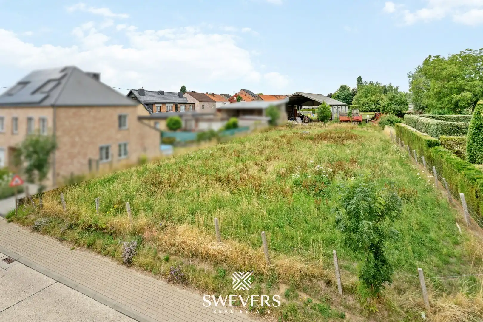 Bouwgrond voor halfopen bebouwing in hartje Riemst foto 5