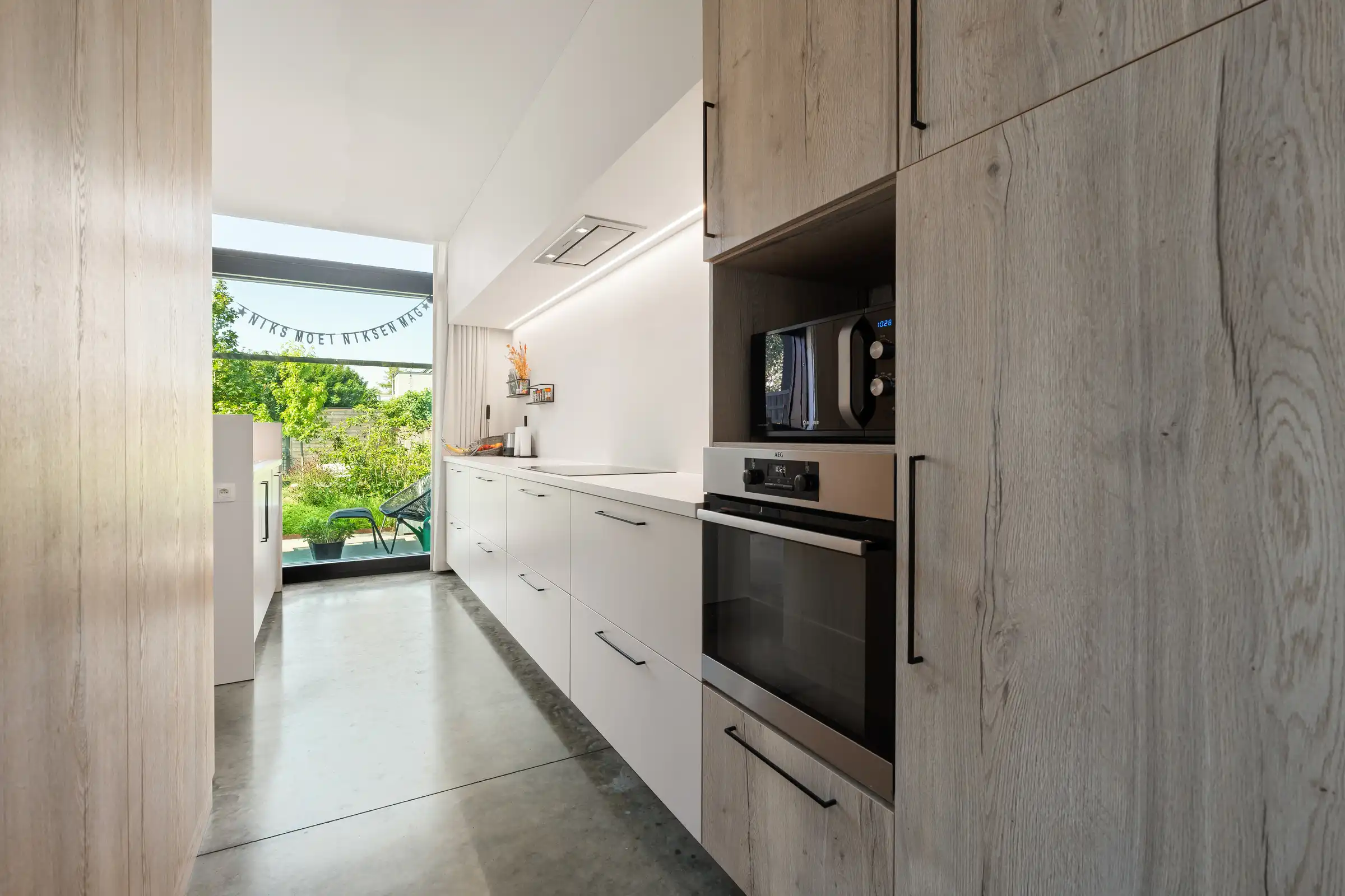 Art-decowoning met 4 slaapkamers, 2 badkmrs en zonnige tuin foto 7