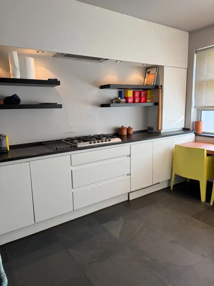 Degelijke woning met 3 slaapkamers gelegen in de rustige, aangename Beukenstraat. foto 3