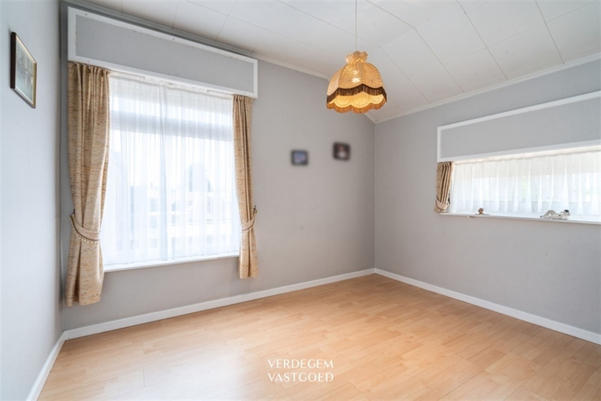 Jaren '60 woning met 4 slaapkamers, garage en leuke tuin foto 12
