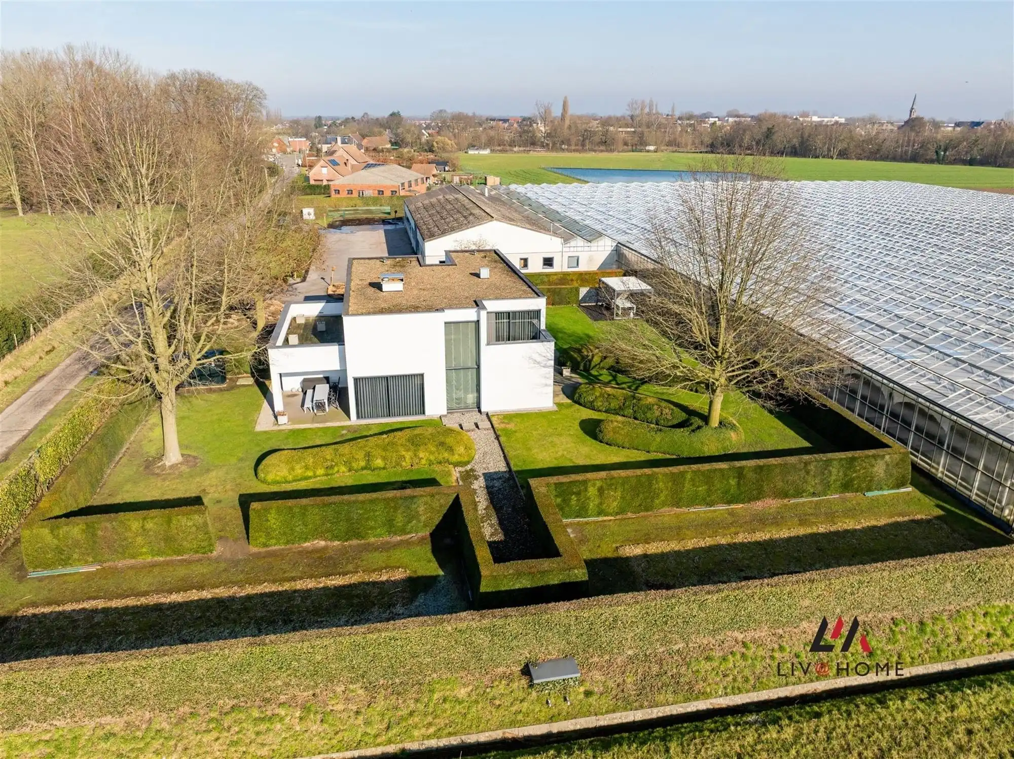 Moderne landbouwwoning met serre en loods op +/- 2  ha foto 30