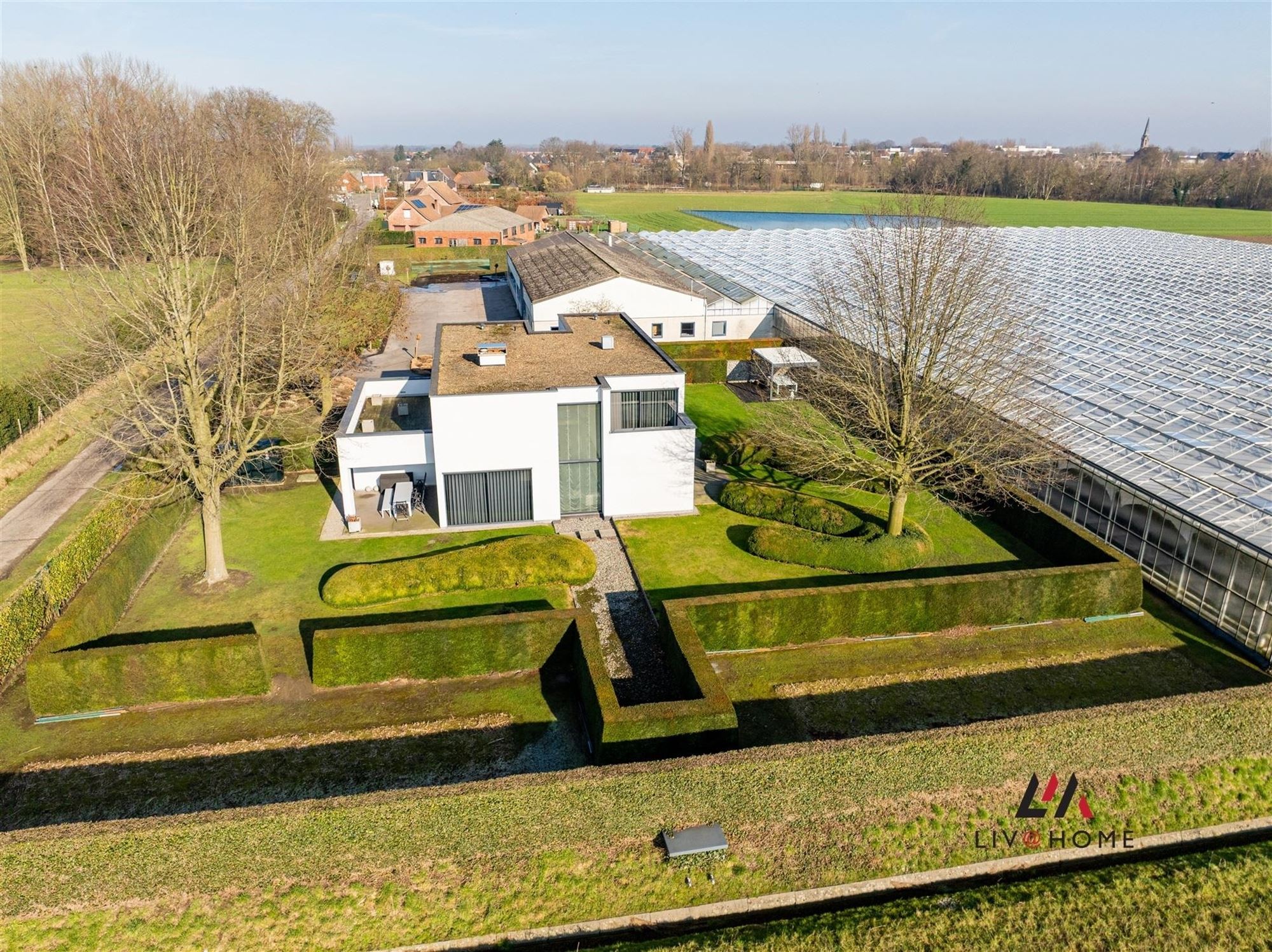 Moderne landbouwwoning met serre en loods op +/- 2  ha foto 30