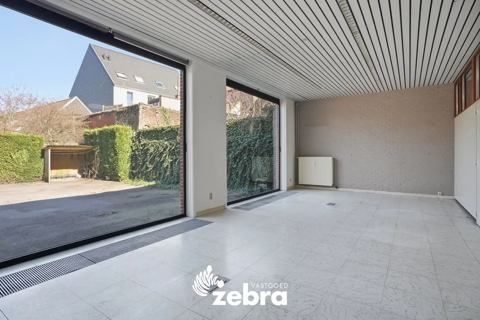 Veelzijdig handelspand met parkeerplaatsen op topligging in centrum Tielt! foto 13