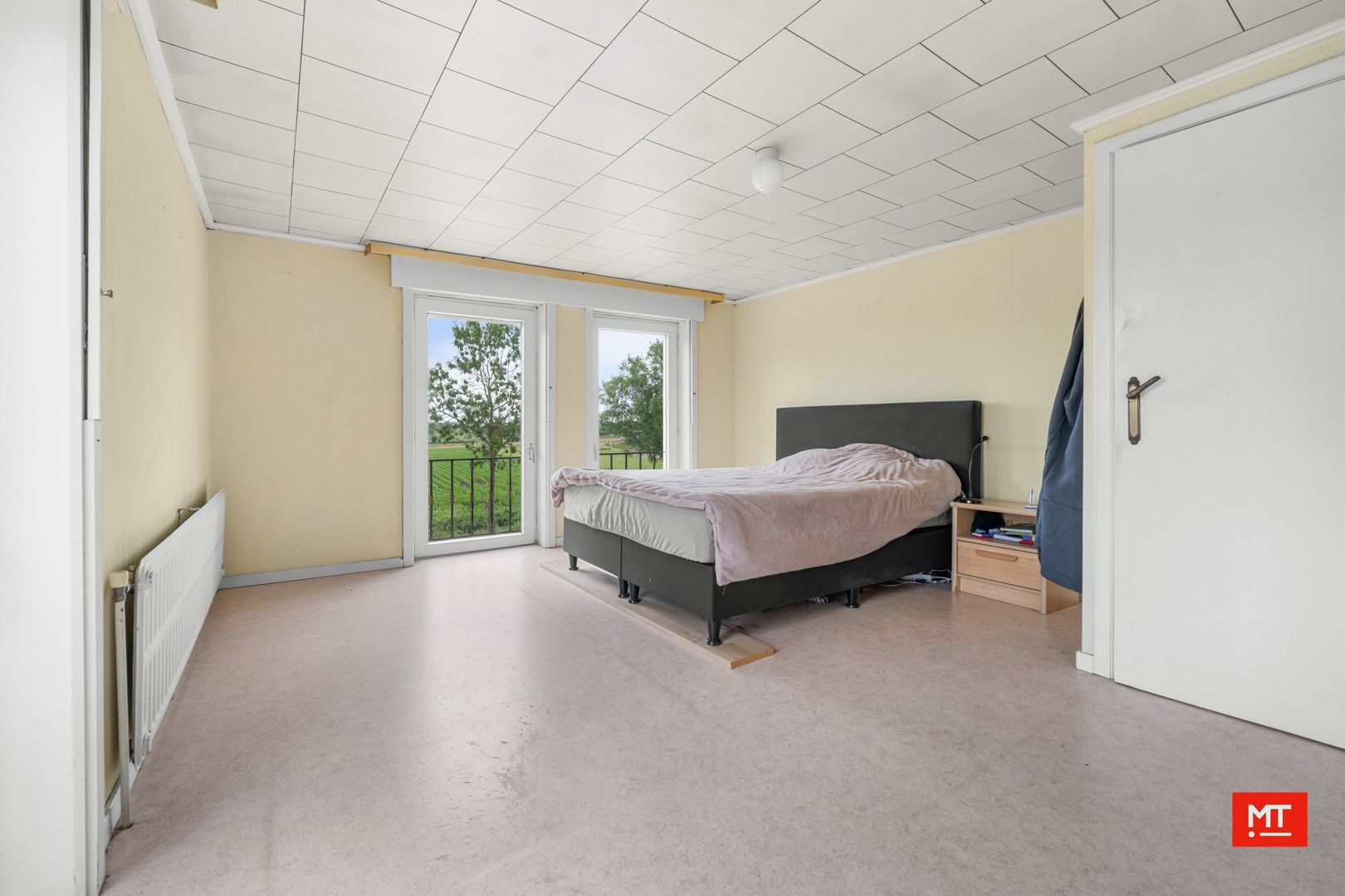Op te frissen halfopen woning met 4 slaapkamers, tuin en garage foto 8