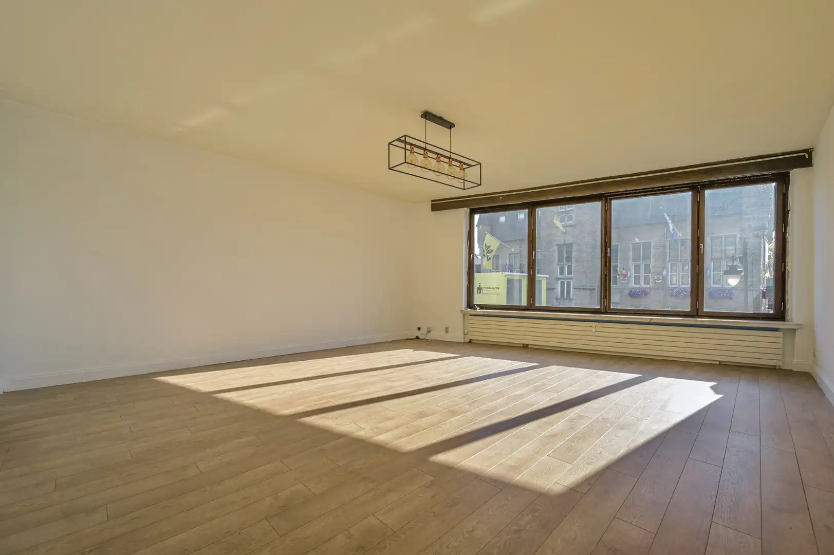 Handelspand met ruim appartement te huur in het hart van Bornem foto 9