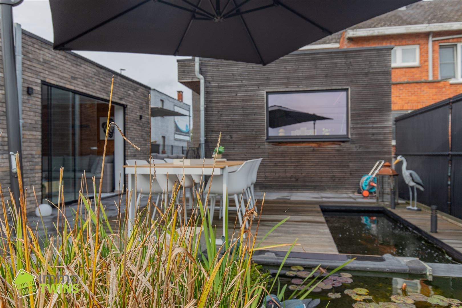 Instapklare en stijlvolle HOB met bijgebouw, tuin en visvijver te Dendermonde (Schoonaarde) foto 14