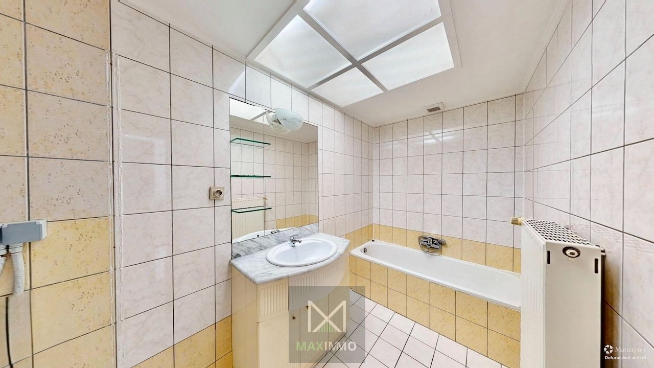 Instapklare, lichtrijke gezinswoning met grote tuin te Menen foto 8