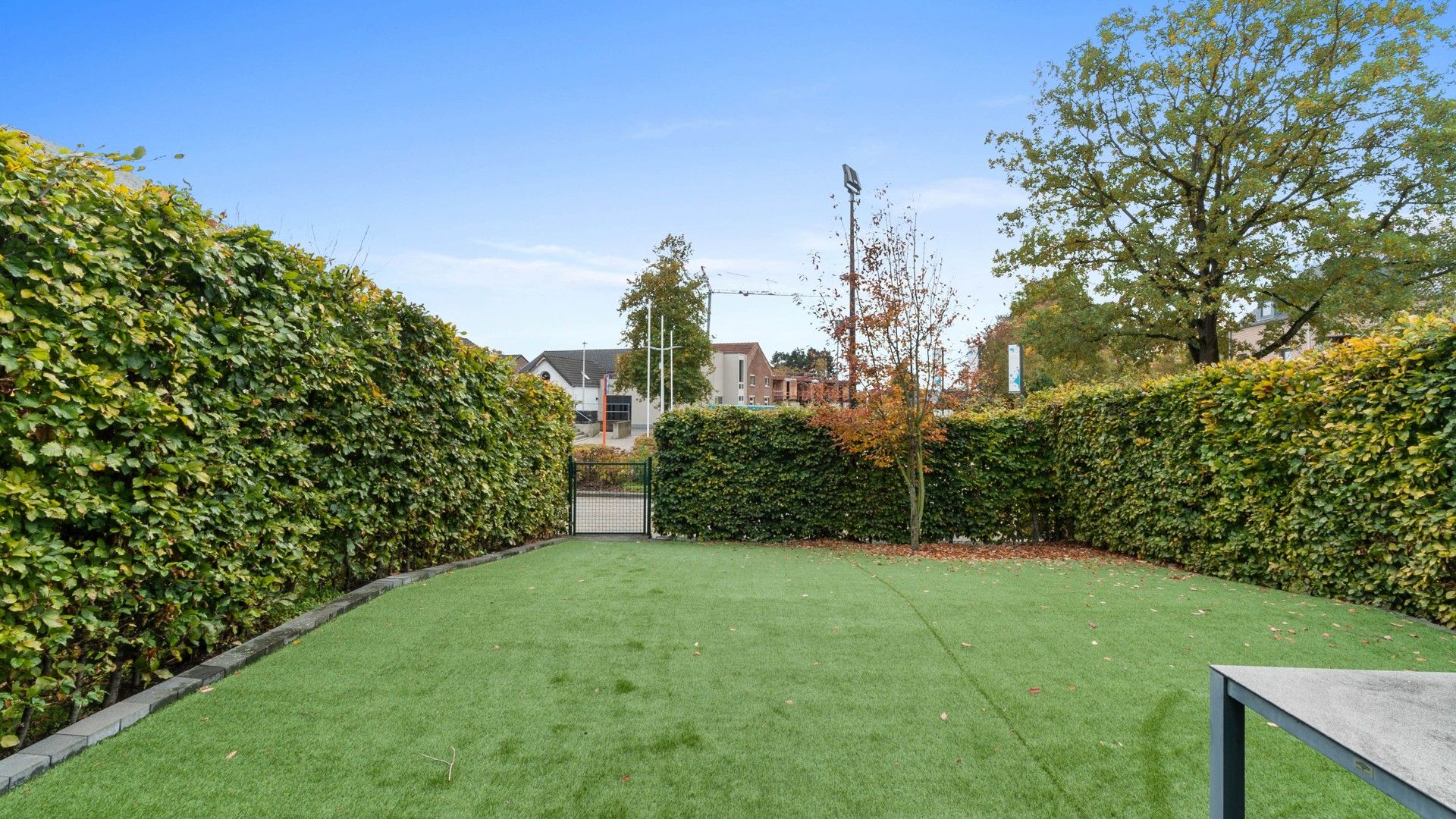 Gelijkvloers appartement met 2 slaapkamers, terras en tuin. Inclusief parking en kelderberging. foto 12