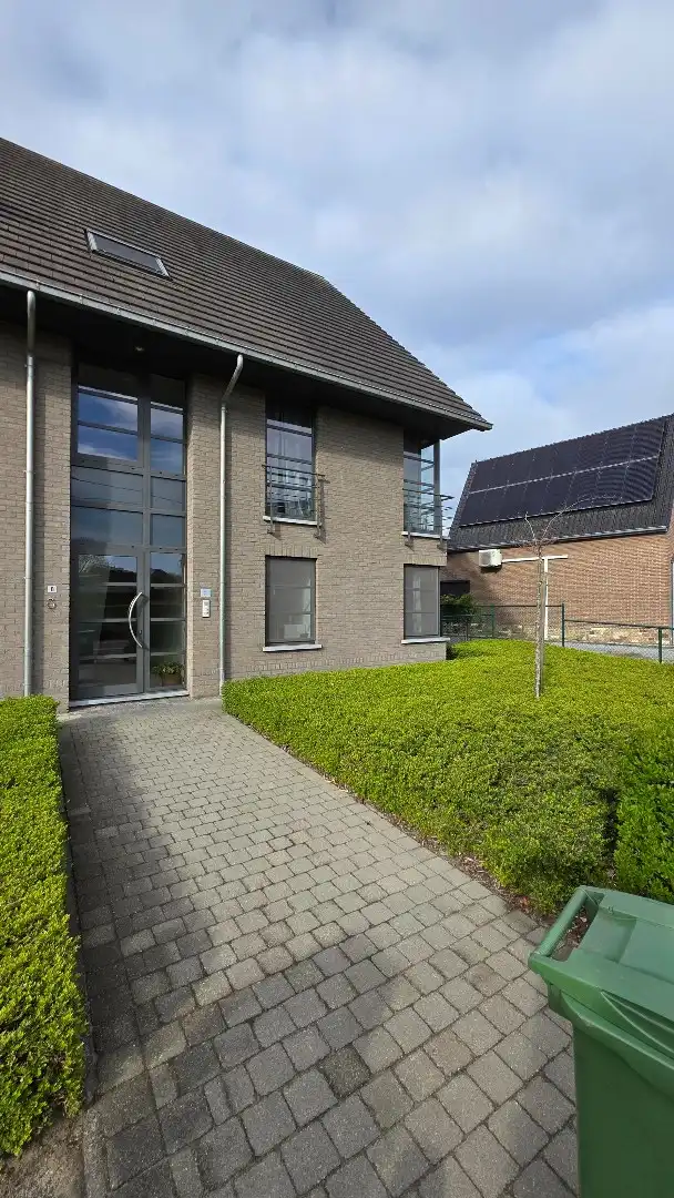 Ruim gelijkvloers appartement met tuin en garage foto 18